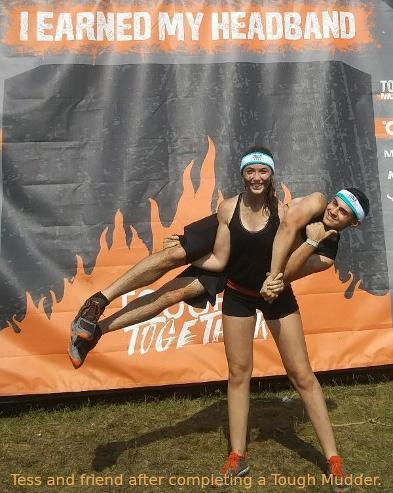 Tess and friend after completing a Tough Mudder.